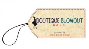 Boutique Blowout presented by Shop Local Raleigh retail tag with Boutique Blowout Sale presented by Shop Local Raleigh written on the tag.