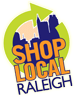 Logo of Shop Local Raleigh with orange text, purple Downtown Raleigh skyline and bright yellow/green arrow circling the logo.