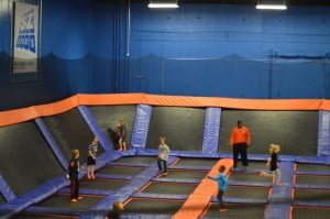 picture of children jumping on trampolines at a trampoline indoor park.